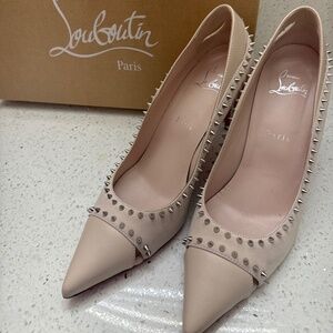 Christian Louboutin red bottoms, duvette spikes